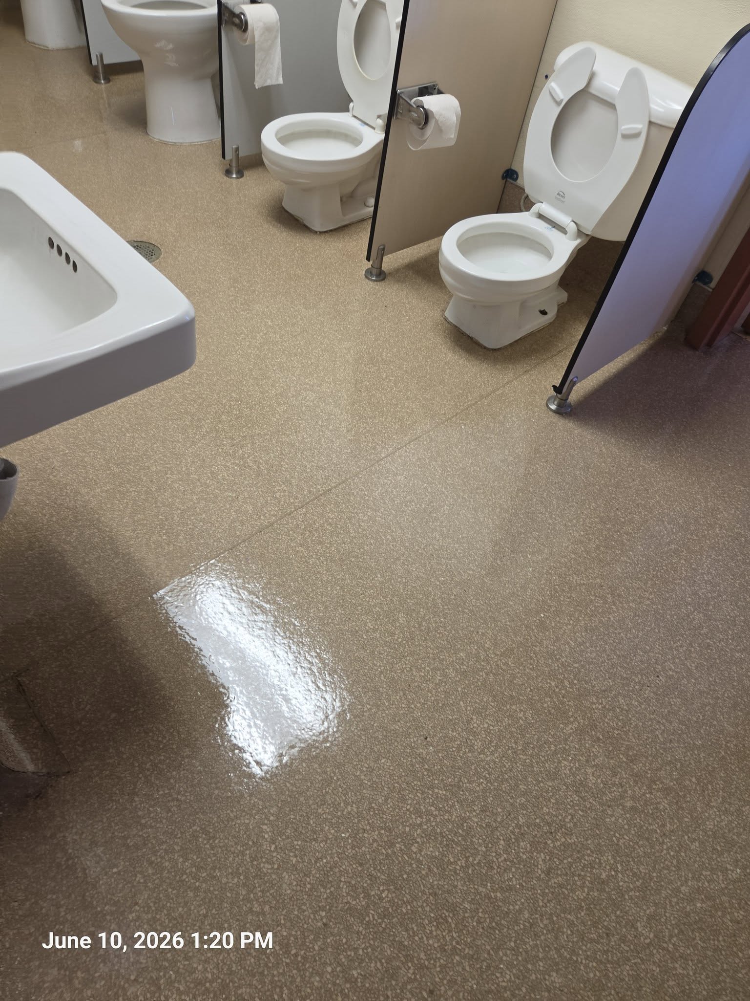 Clean shiny VCT floor after Desert Clean strip and wax