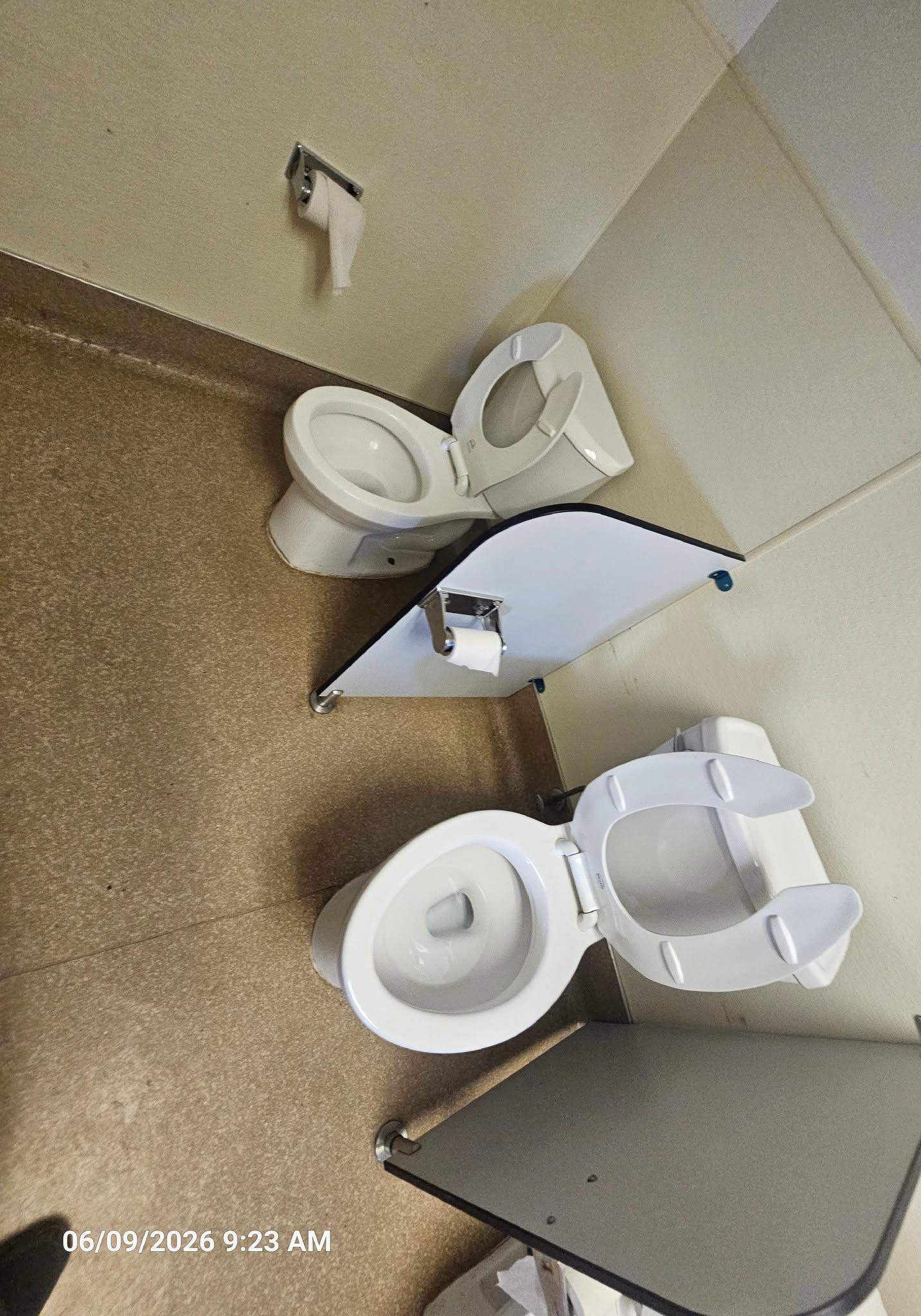 Dirty commercial bathroom VCT floor before cleaning